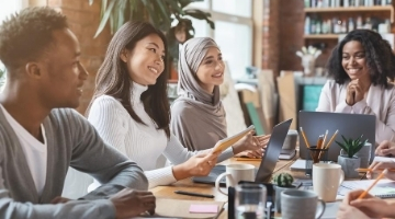 Diverse folks in a meeting